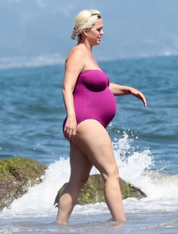 Katy Perry pregnant in a purple swimsuit #90400578