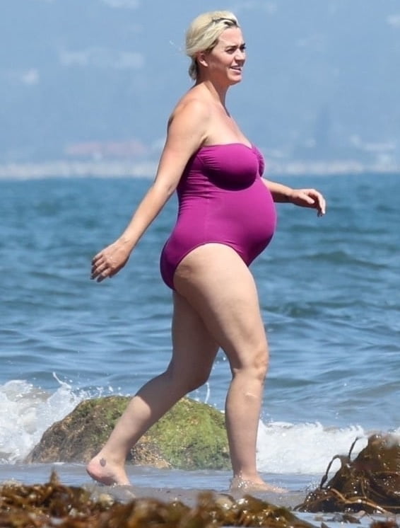 Katy Perry pregnant in a purple swimsuit #90400580