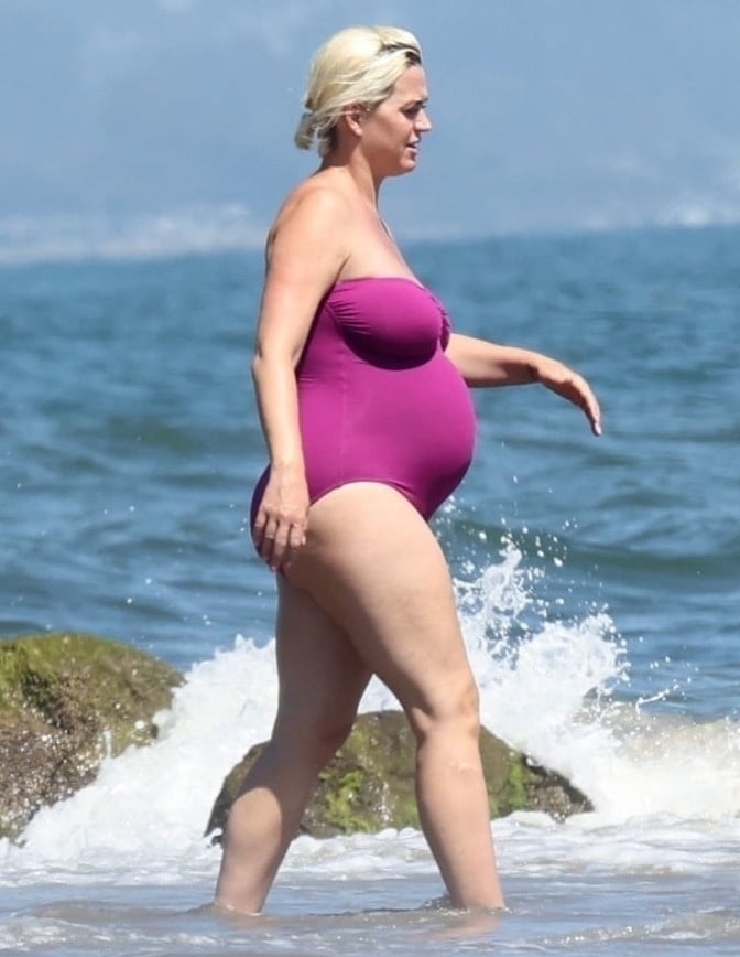 Katy Perry pregnant in a purple swimsuit #90400582