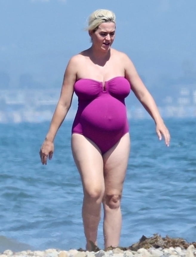 Katy Perry pregnant in a purple swimsuit #90400584