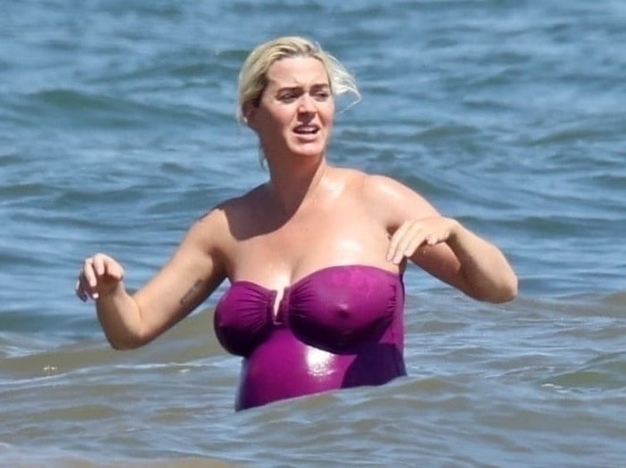 Katy Perry pregnant in a purple swimsuit #90400586