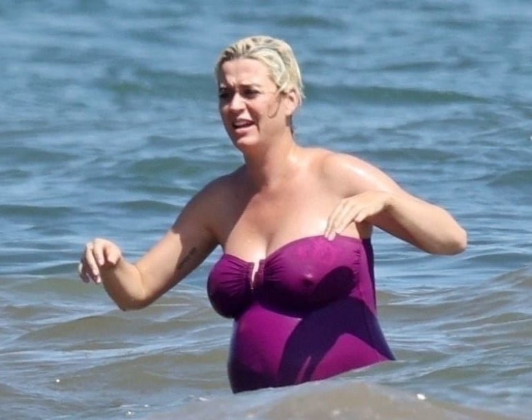 Katy Perry pregnant in a purple swimsuit #90400588