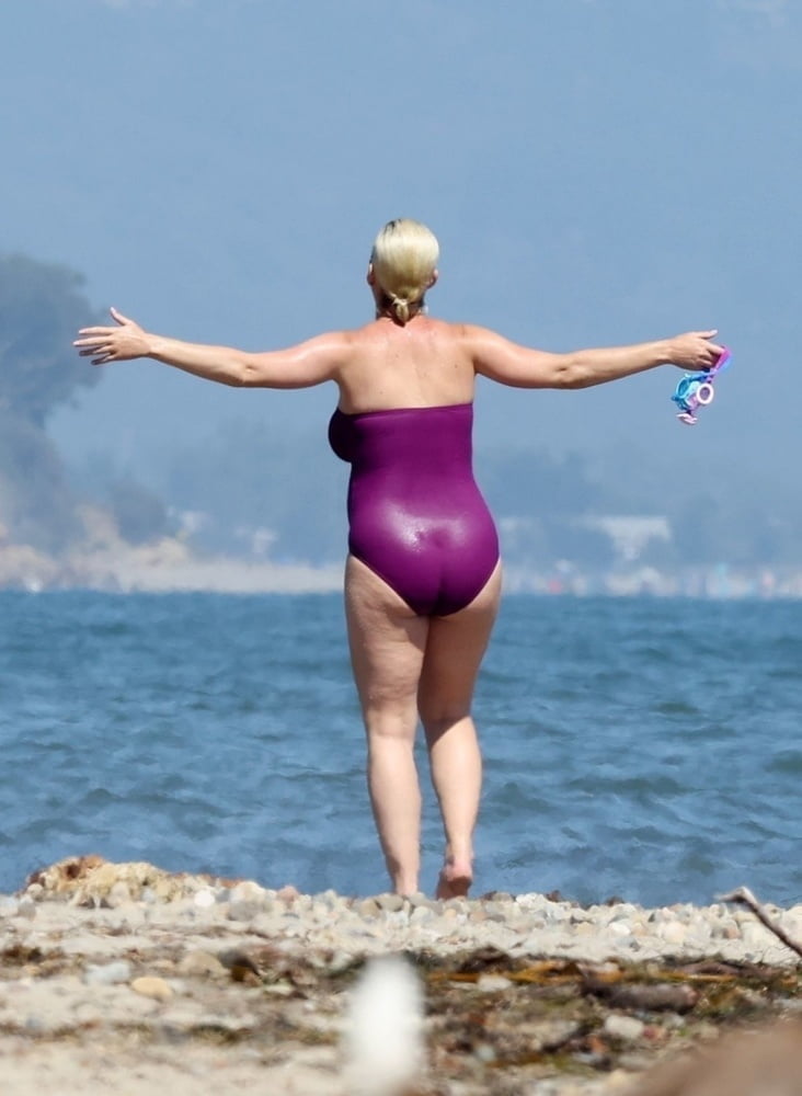 Katy Perry pregnant in a purple swimsuit #90400592