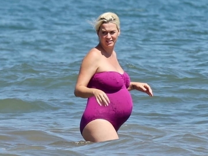 Katy Perry pregnant in a purple swimsuit #90400593