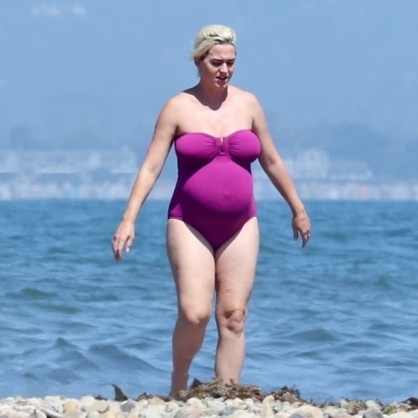 Katy Perry pregnant in a purple swimsuit #90400594