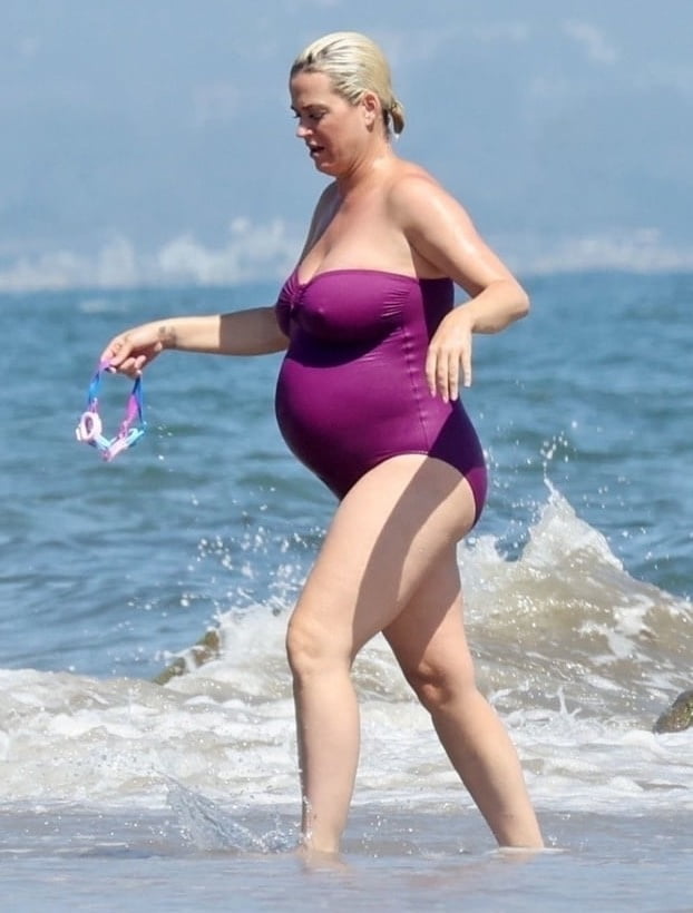Katy Perry pregnant in a purple swimsuit #90400597