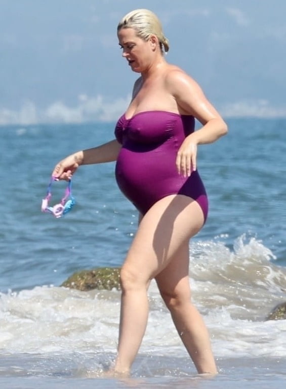 Katy Perry pregnant in a purple swimsuit #90400598