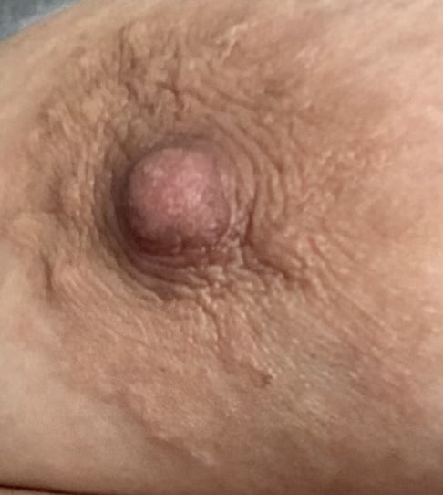 Anatomy of a big brown bbw nipple close up and natural #106931628
