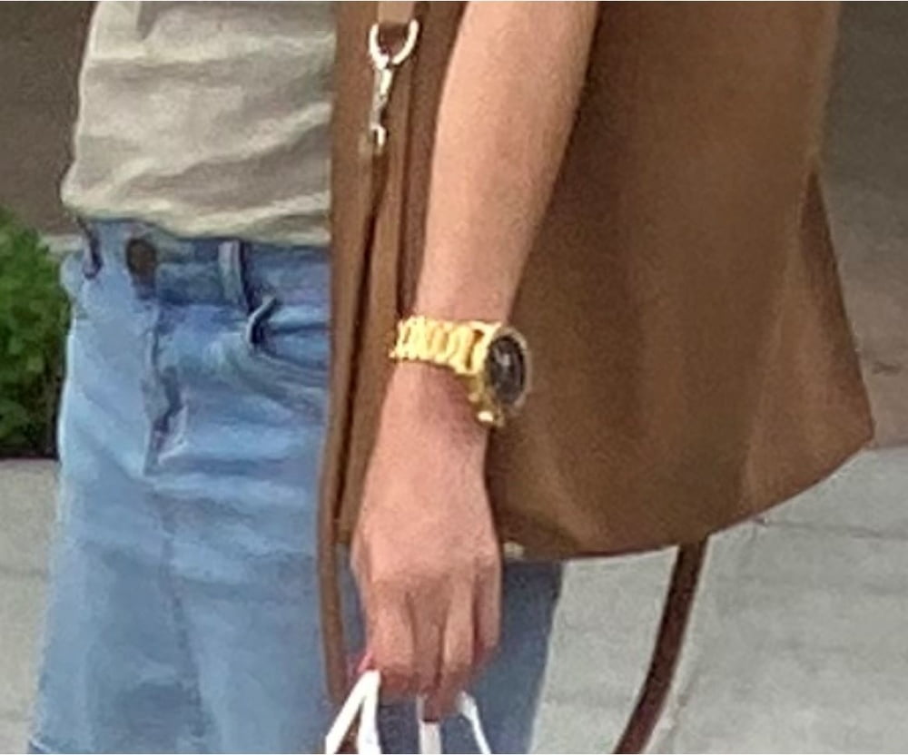 Help to identify this gold watch please #103243978