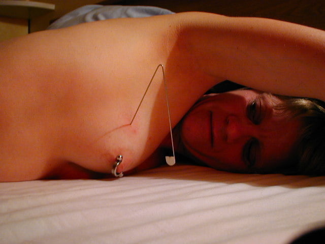 needles in tits, safety pins... #87881796