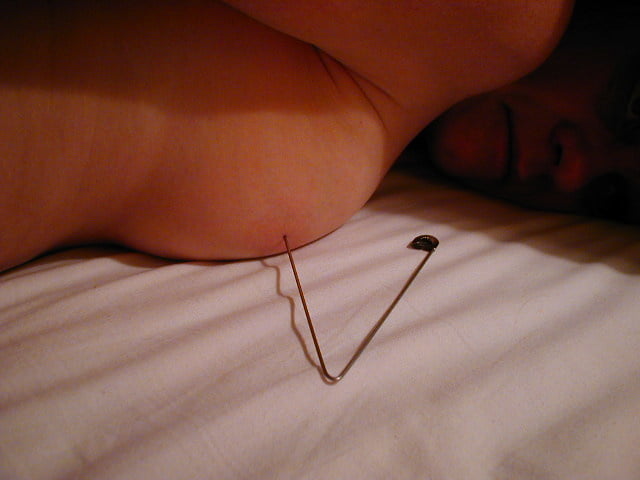 needles in tits, safety pins... #87881802