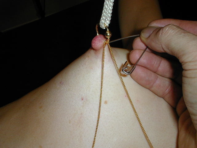needles in tits, safety pins... #87881860