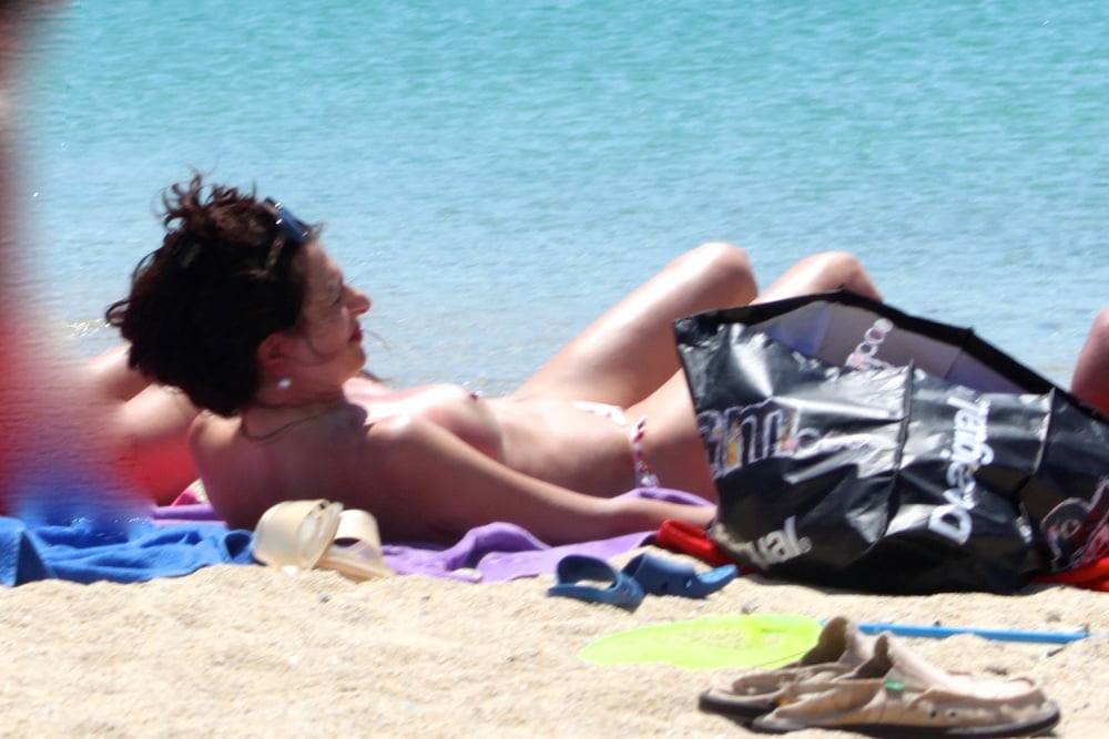 Italian mom white tits topless Mykonos beach #82432527