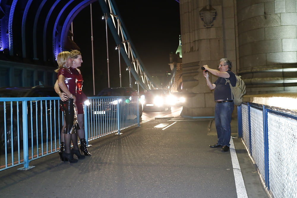 Walking over Tower Bridge in Latex Dresses #107205262