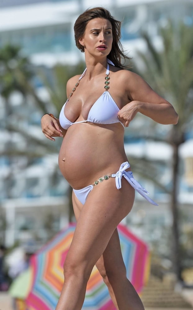 Pregnant celebrities in the beach #104315085