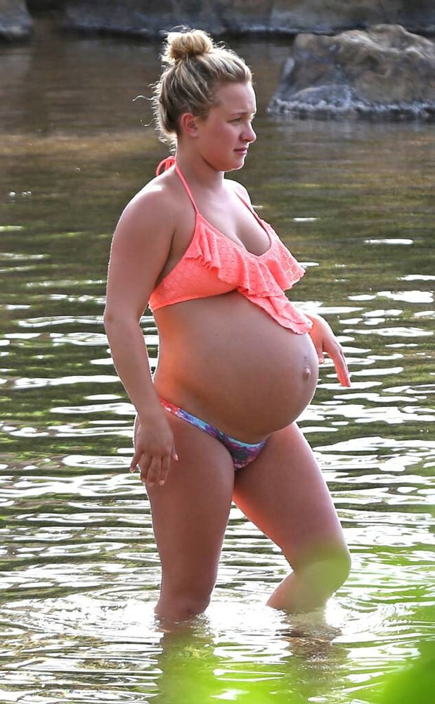 Pregnant celebrities in the beach #104315088