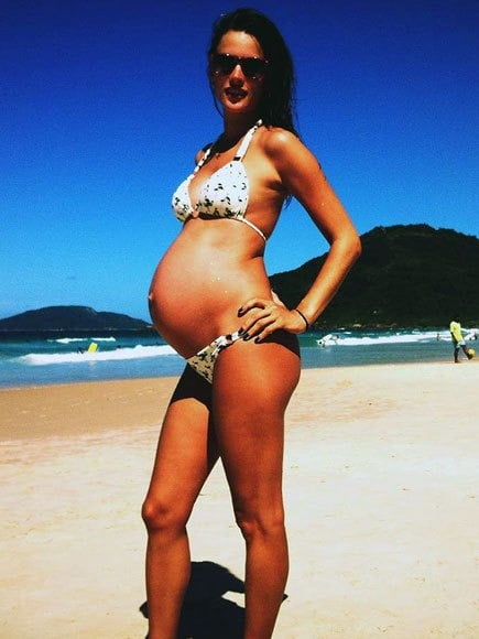 Pregnant celebrities in the beach #104315092