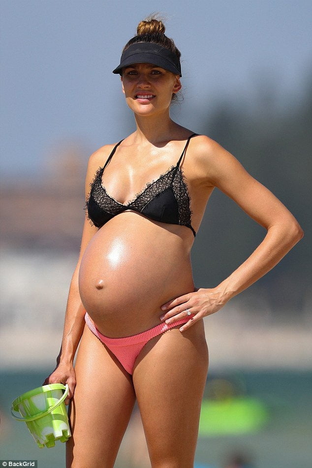 Pregnant celebrities in the beach #104315094