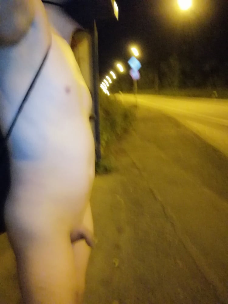 Naked at the bus stop at night #106956920