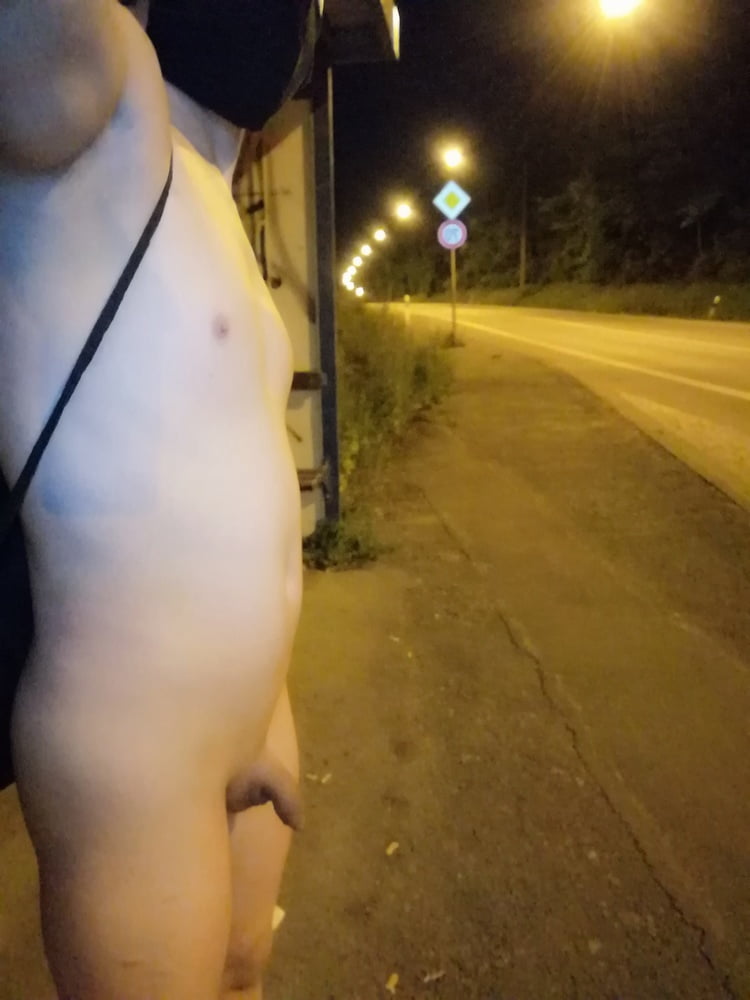 Naked at the bus stop at night #106956923