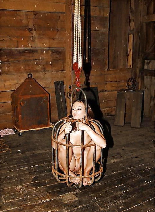 Slaves packaged in their cages #94129763