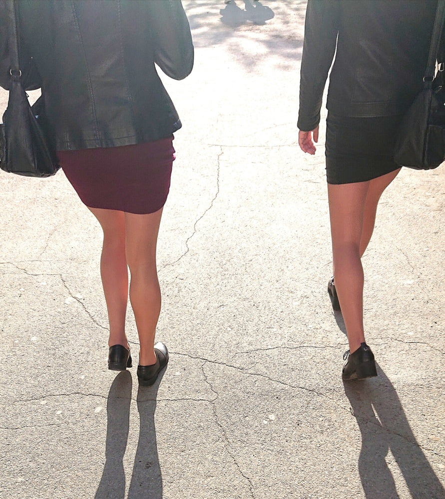 Two whores in pantyhose on the street #97264918