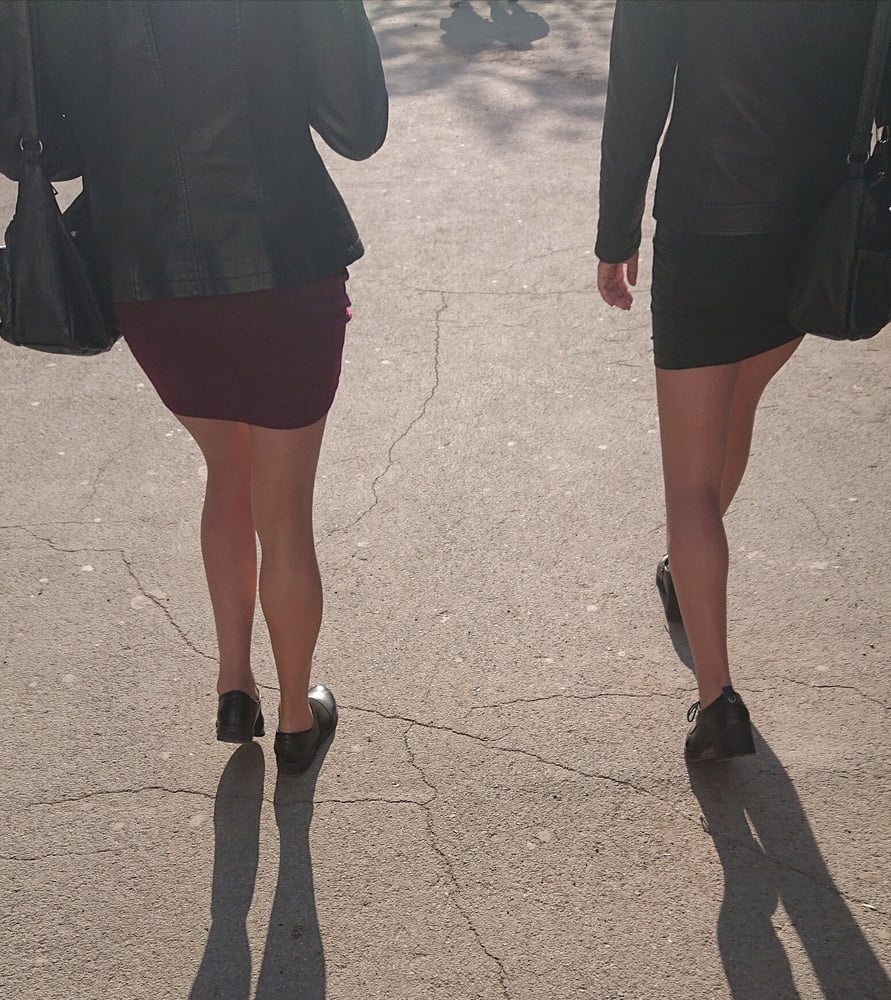 Two whores in pantyhose on the street #97264921