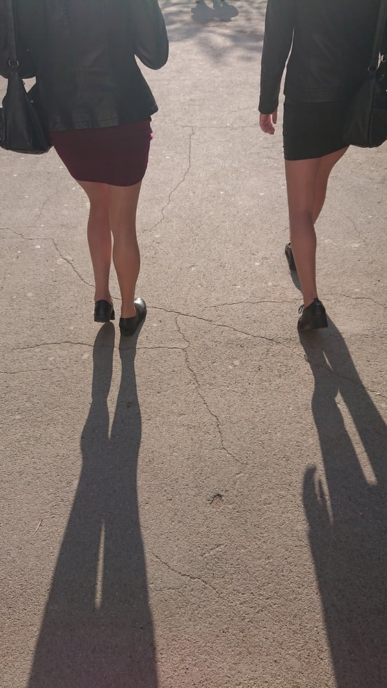 Two whores in pantyhose on the street #97264922