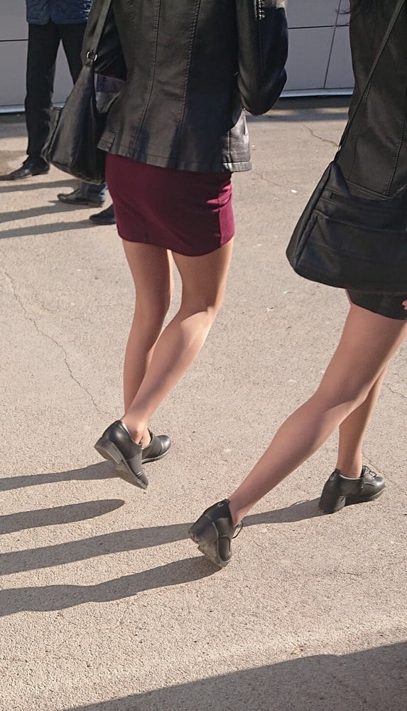Two whores in pantyhose on the street #97264923