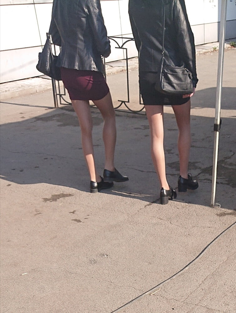 Two whores in pantyhose on the street #97264925