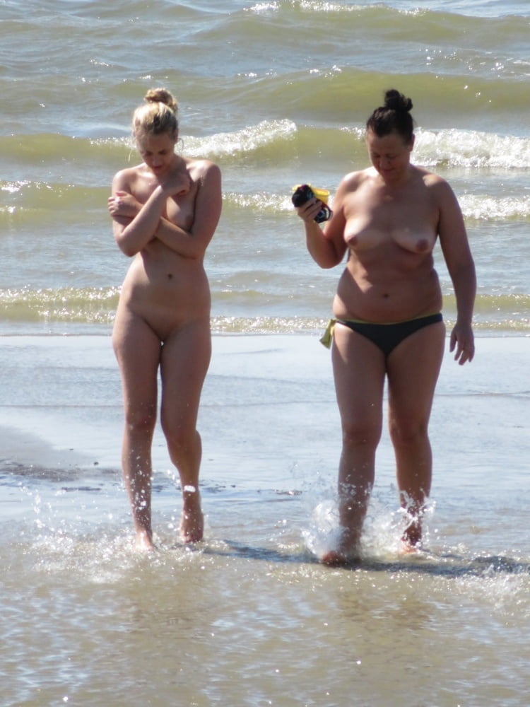Blond Nudist Girl Shy on the Fkk Beach #98545623