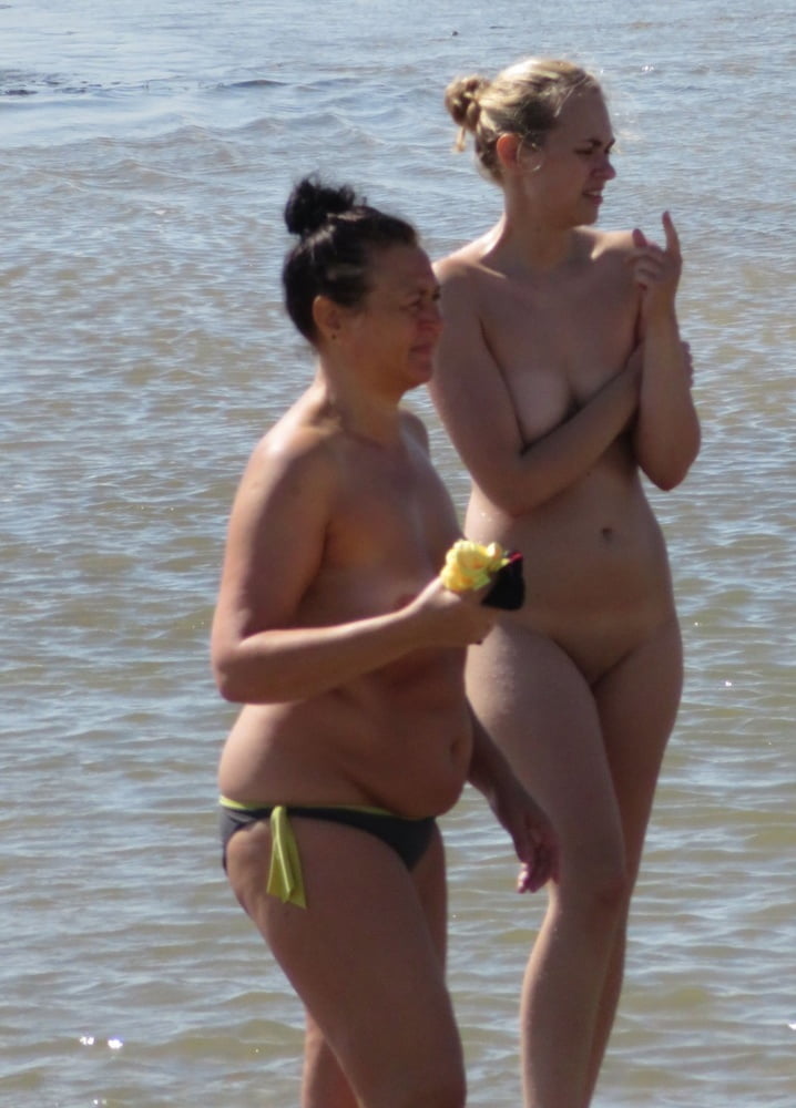 Blond Nudist Girl Shy on the Fkk Beach #98545647