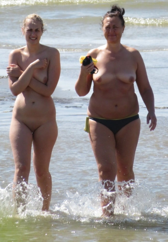 Blond Nudist Girl Shy on the Fkk Beach #98545653