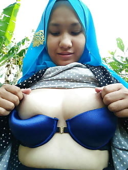 Malaysisches Hijab-Mädchen 1
 #99860833