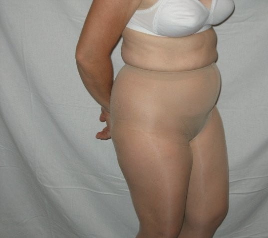 Pantyhose and a white bra #105990427