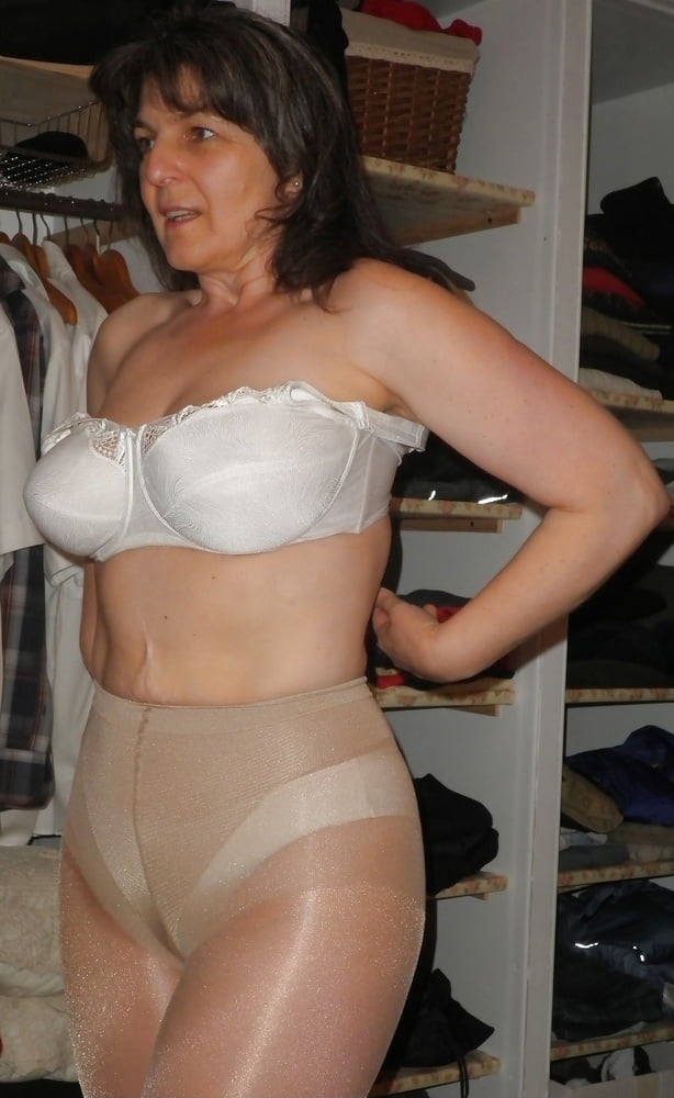 Pantyhose and a white bra #105990448