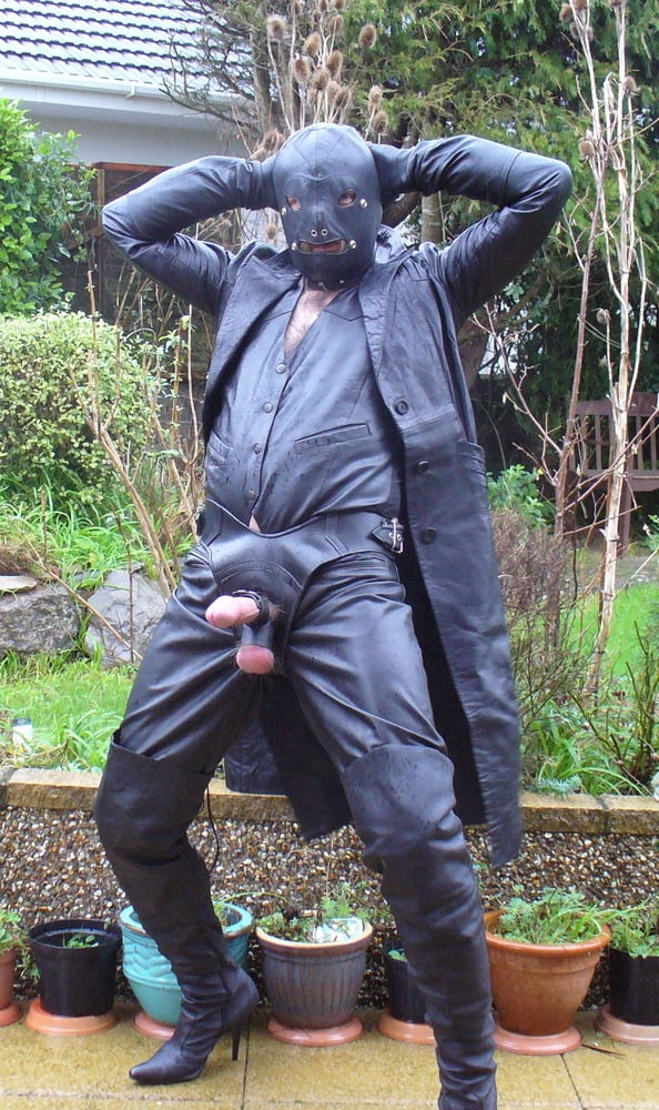 Leather Master in cock harness, boots and hood #107099304