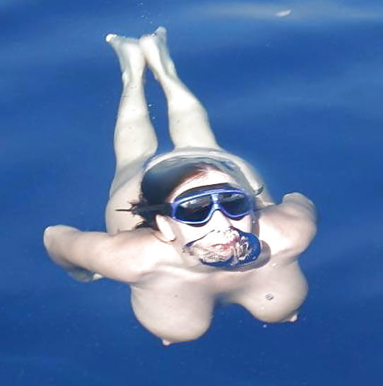 Enjoying her underwater tits #97052472