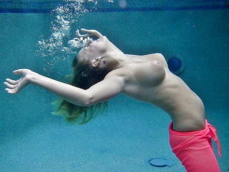 Enjoying her underwater tits #97052499