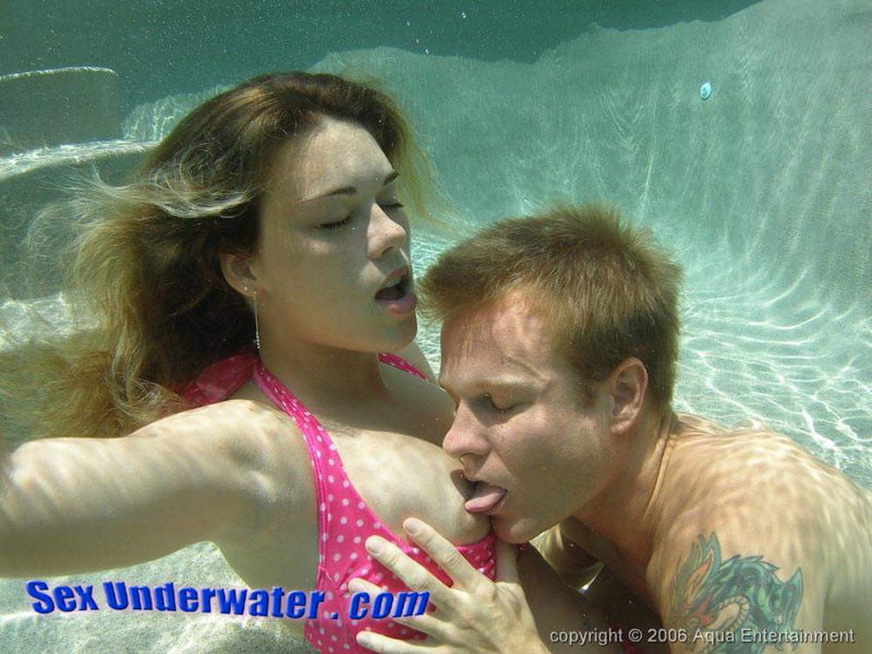 Enjoying her underwater tits #97052521