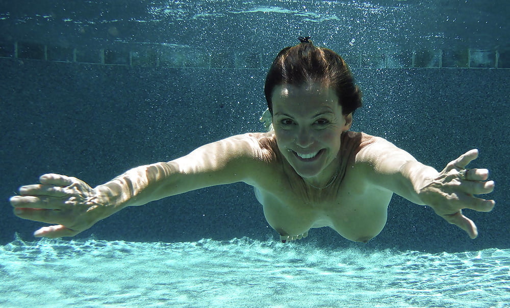 Enjoying her underwater tits #97052532
