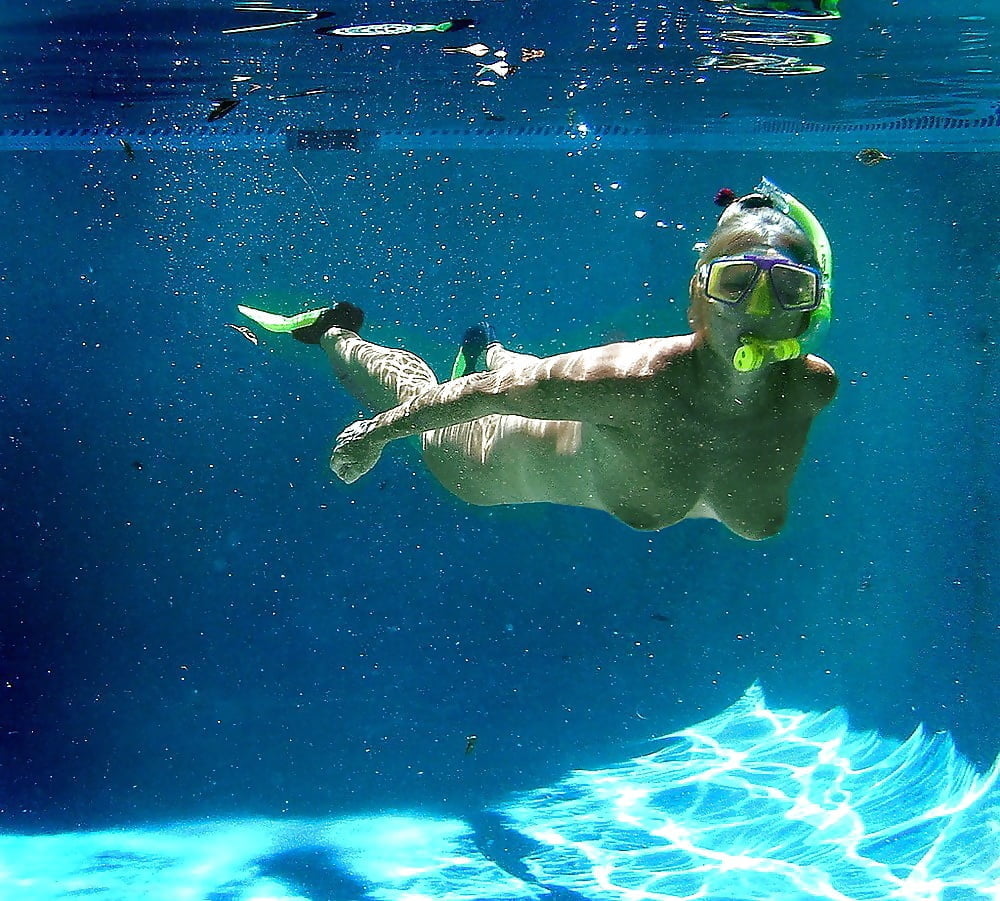 Enjoying her underwater tits #97052541