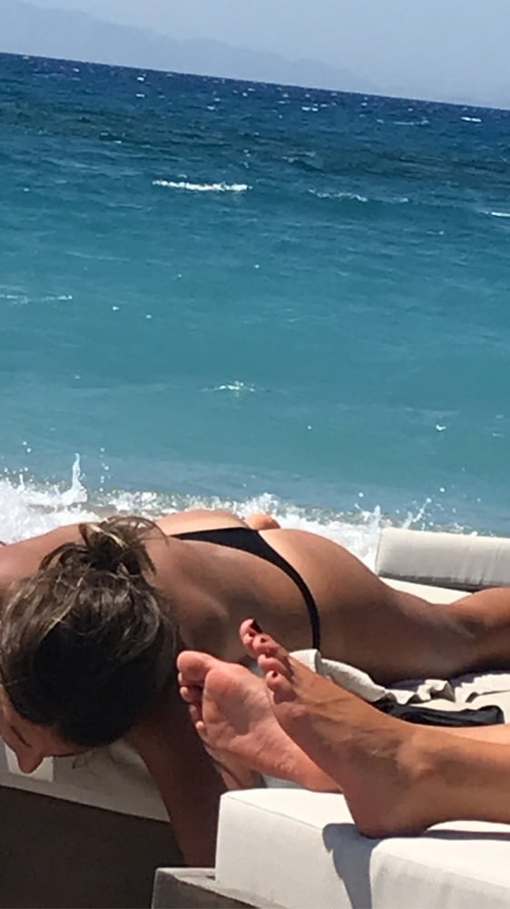 Girl #1 Topless at beach in Greece #81764043
