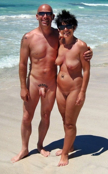 0789  Nude beach couple and caress. #93455036