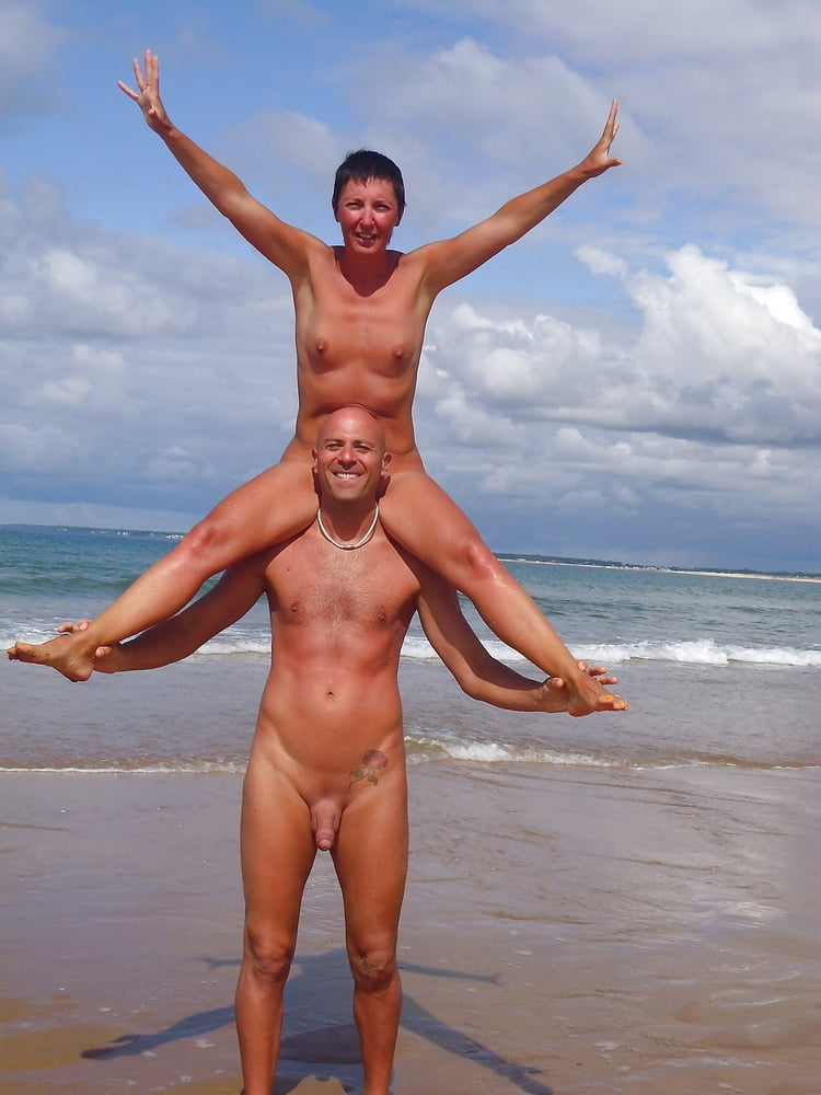 0789  Nude beach couple and caress. #93455129