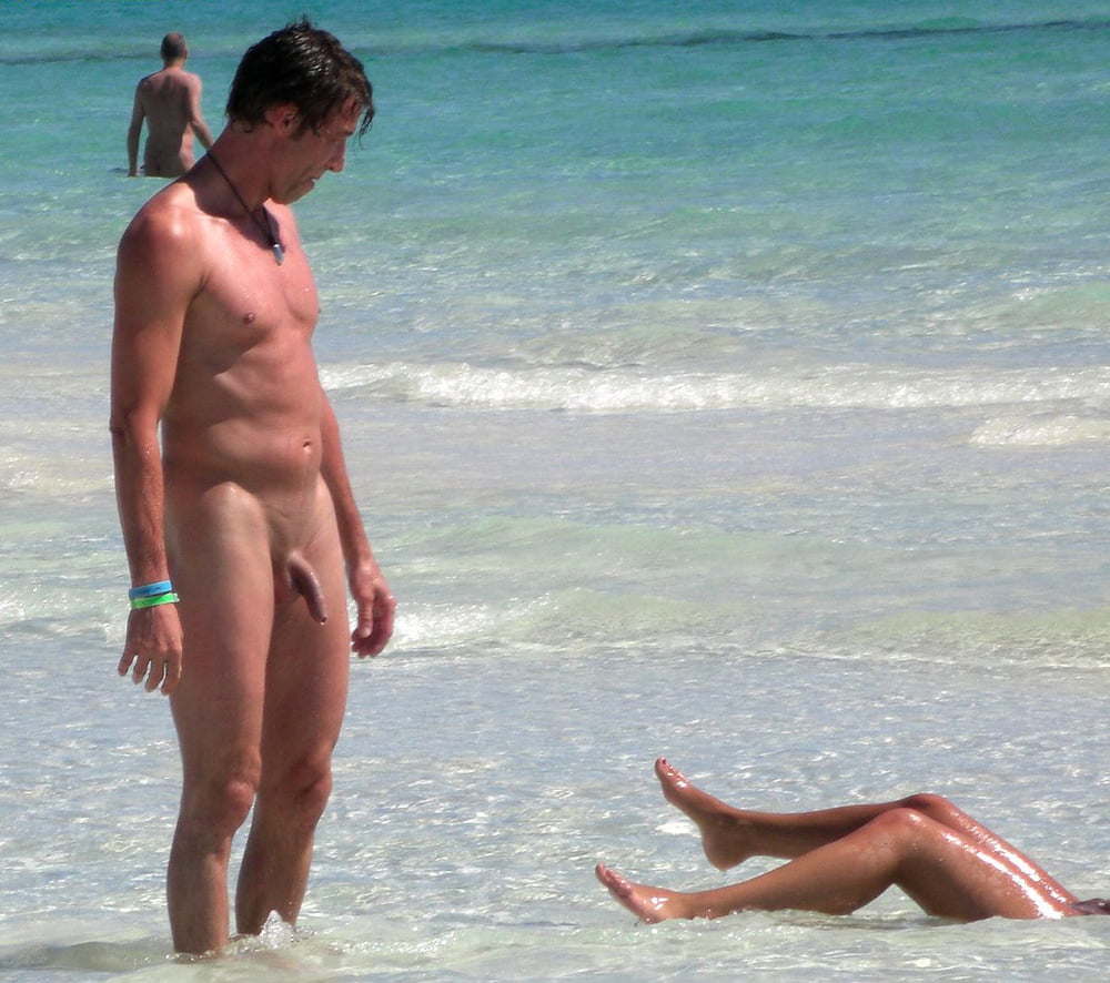 0789  Nude beach couple and caress. #93455179