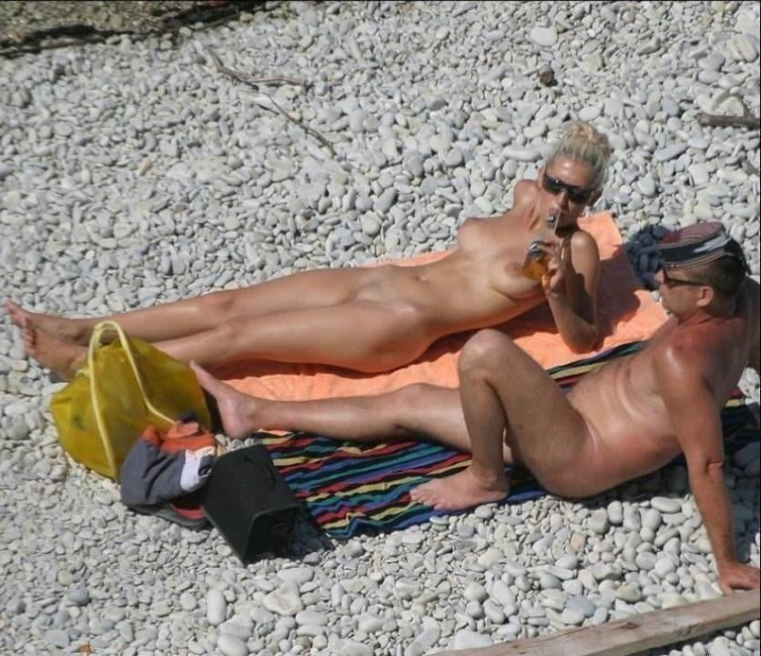 0789  Nude beach couple and caress. #93455264