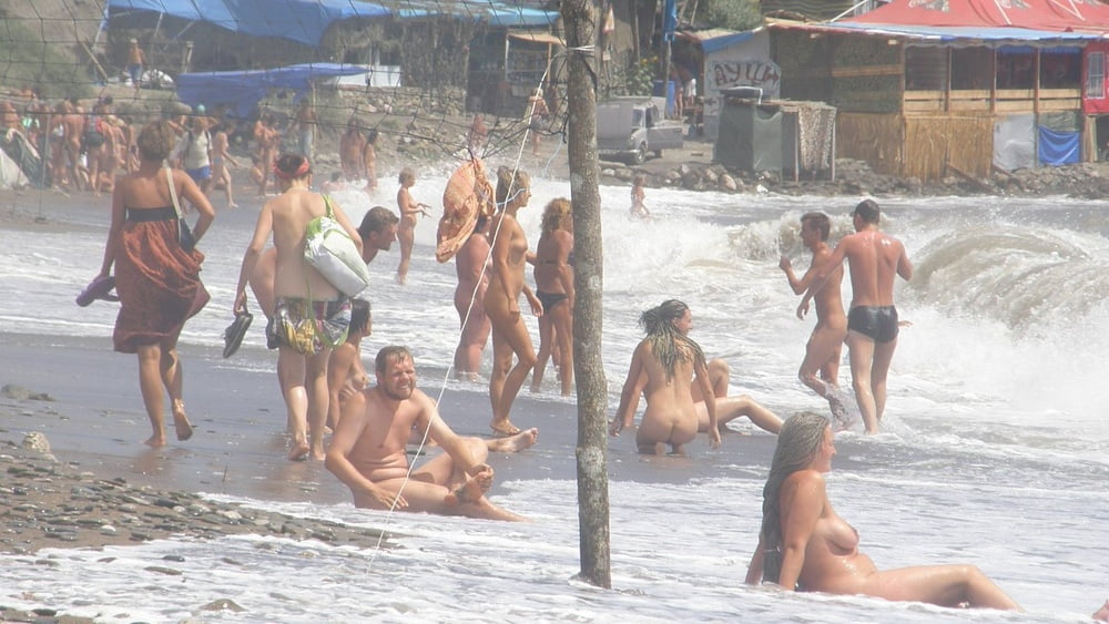 0789  Nude beach couple and caress. #93455720