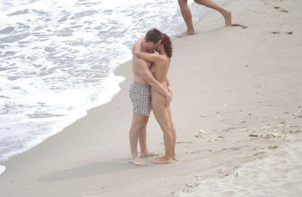 0789  Nude beach couple and caress. #93455869