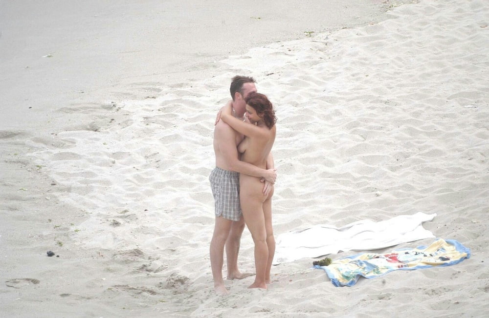 0789  Nude beach couple and caress. #93455875